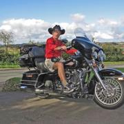 EASY RIDER: Tony Gervis on his Harley Davidson, complete with shorts and Stetson, above, and a selection of some of his photos.