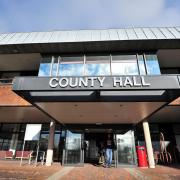 More than 100 county council workers face the prospect of a 5% pay cut