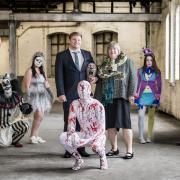 SUCCESS STORY: Dom Portman with Councillor Lucy Hodgson, chairman of Worcester City Council’s place and economic development sub-committee, and members of the Fancy Dress Worldwide team dressed in Halloween outfits.Picture: Andy Burton.