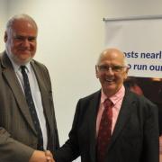 NEW CHAIRMAN: Mark Hopton with outgoing chairman David Butcher.