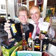 CHEERS: Lynne and Pete Browne, owners of the Pepper and Oz brassiere with some of their locally-sourced produce. 18205701