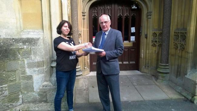 Diane Pugh presents the Operation Badger petition to Councillor David Hughes.