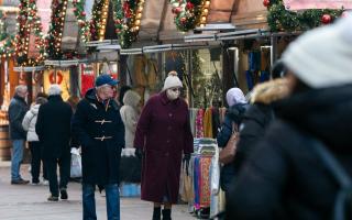 People browsing the Christmas market in Nottingham, the city where one of the two cases of the Omicron variant of Covid-19 were identified last week. Photo: PA.