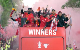 Liverpool players on an open-top bus during the trophy parade in Liverpool. Picture date: Sunday May 29, 2022..