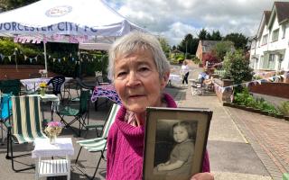 MEMORIES: Jeni Rowberry of Sebright Avenue with a picture of herself around the time of the Coronation of Queen Elizabeth II