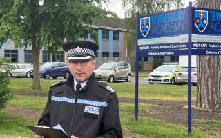 POLICE: Assistant Chief Constable Richard Ocone, of Gloucestershire Police, reads a statement to reporters outside Tewkesbury Academy in Gloucestershire after the alleged attack (PA)