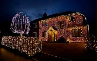 LIHGTS: A family have put up 65,000 lights on their home for charity.