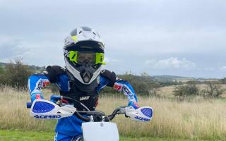 Meyler, age eight, has a passion for riding motocross bikes.
