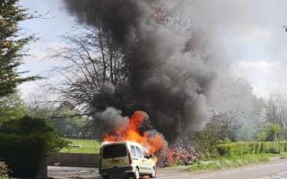 INFERNO: The car fire at Malvern Road in Powick after Clive Jarvis dragged an elderly couple out of the car before it was consumed