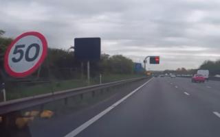 CONFUSING: The M5 signs near Wychbold (junction 5) gave mixed messages with the road sign showing 50mph and the gantry 60mph