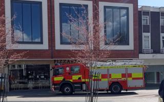 INCIDENT: The fire engine parked outside Pizza Express in Cathedral Plaza in Worcester city centre, opposite Worcester Cathedral