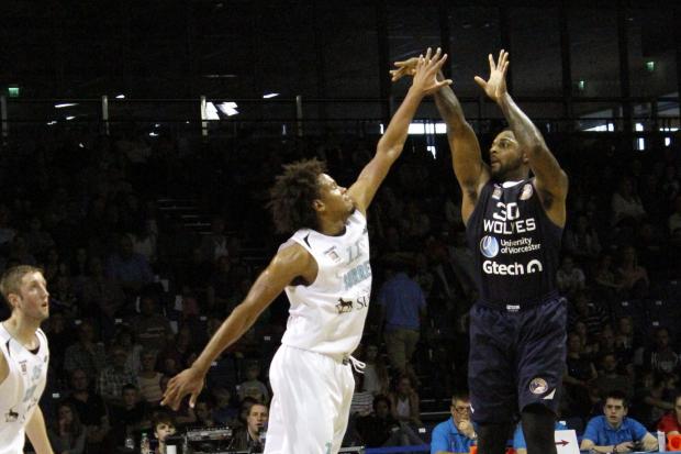 Malik Smith (right) in action for Worcester Wolves.